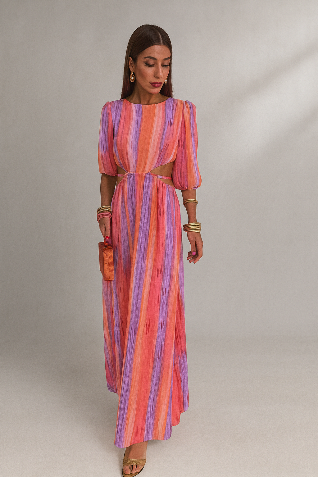 VALERIA – Vestido Largo con Rayas Vibrantes y Detalle Cut-Out en la Cintura