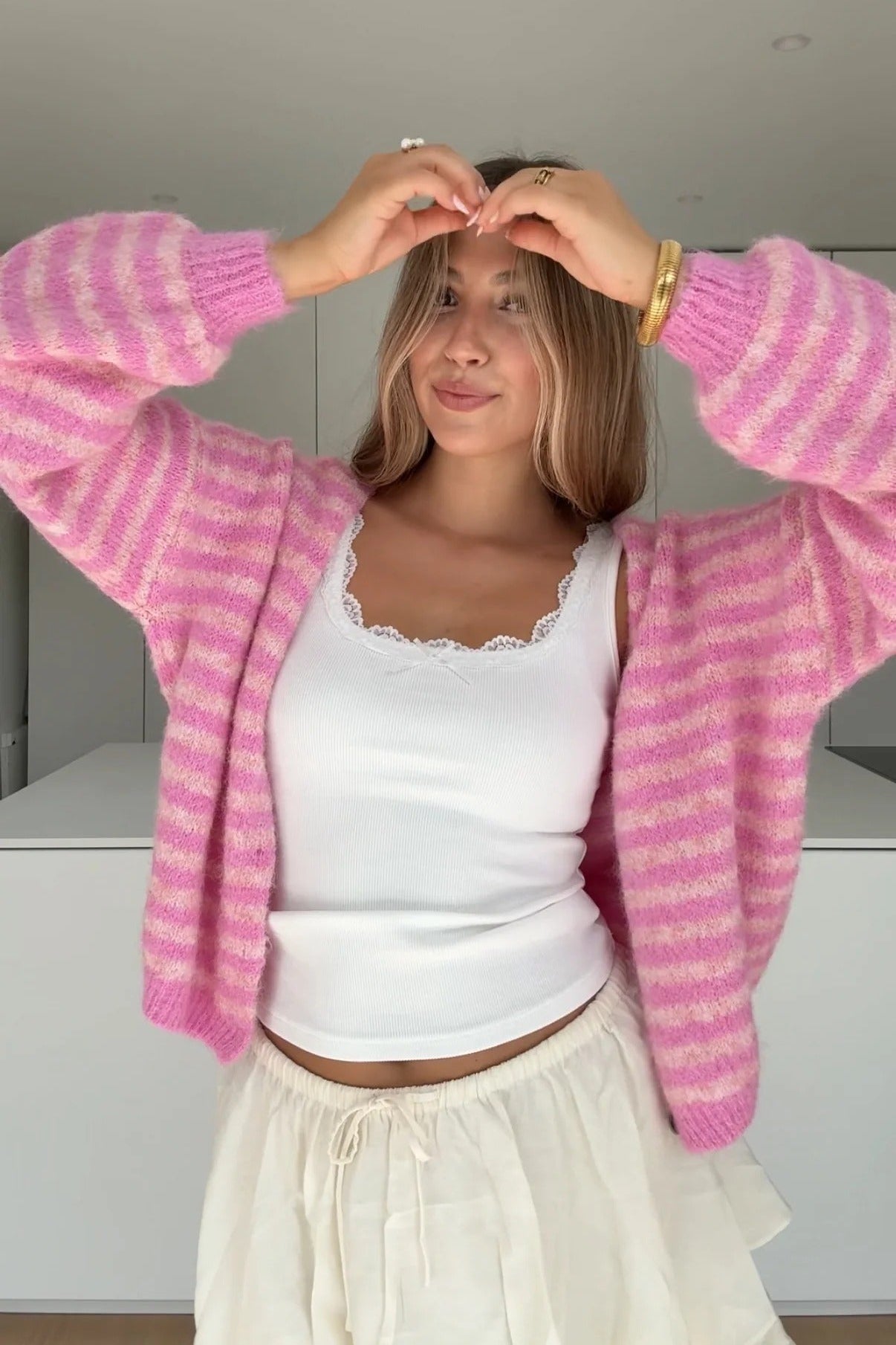 LIA – Cárdigan de Punto Suave a Rayas Color Fresa